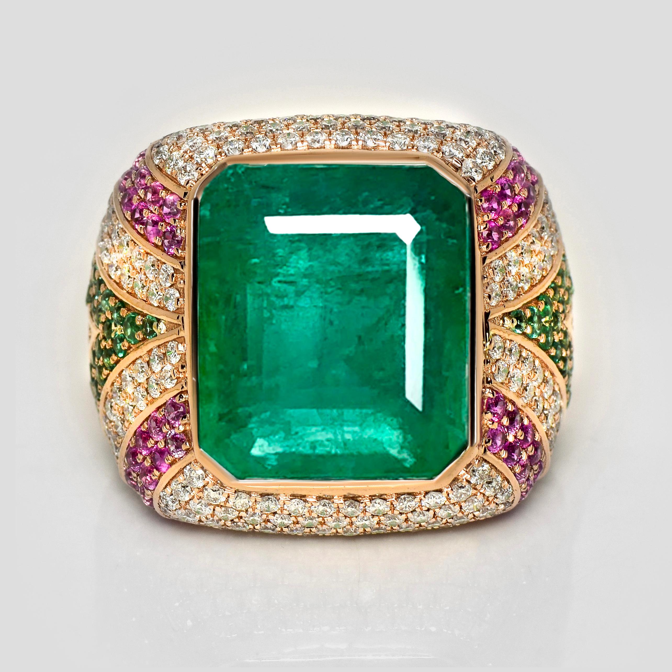 *IGI 17.70 Ct 18K Rose Gold Vivid Green Emerald Diamond Cocktail Ring*

Beautiful 18 Karat rose gold cocktail ring with a natural 17.70 ct great quality green Emerald as center stone surrounding with natural pink sapphires weighing 0.96 ct and
