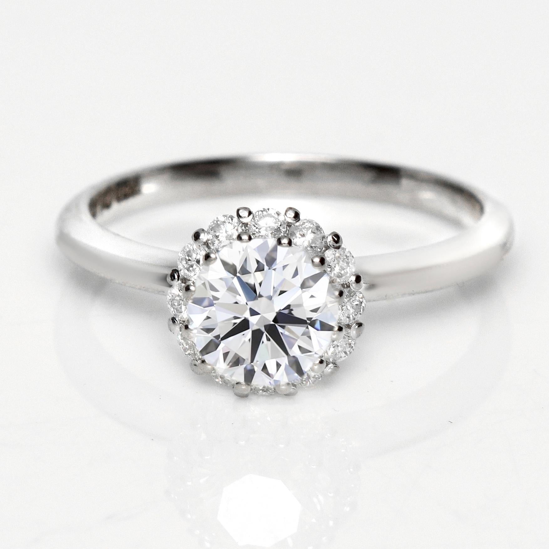*IGI 18K 1.00 Ct G SI2 Natural Diamond Antique Art Deco Engagement Ring* (Bague de fiançailles Art déco)

Un diamant rond de taille brillant certifié IGI G SI2 pesant 1,00 ct serti sur un anneau en or blanc 18 carats de style art déco avec des