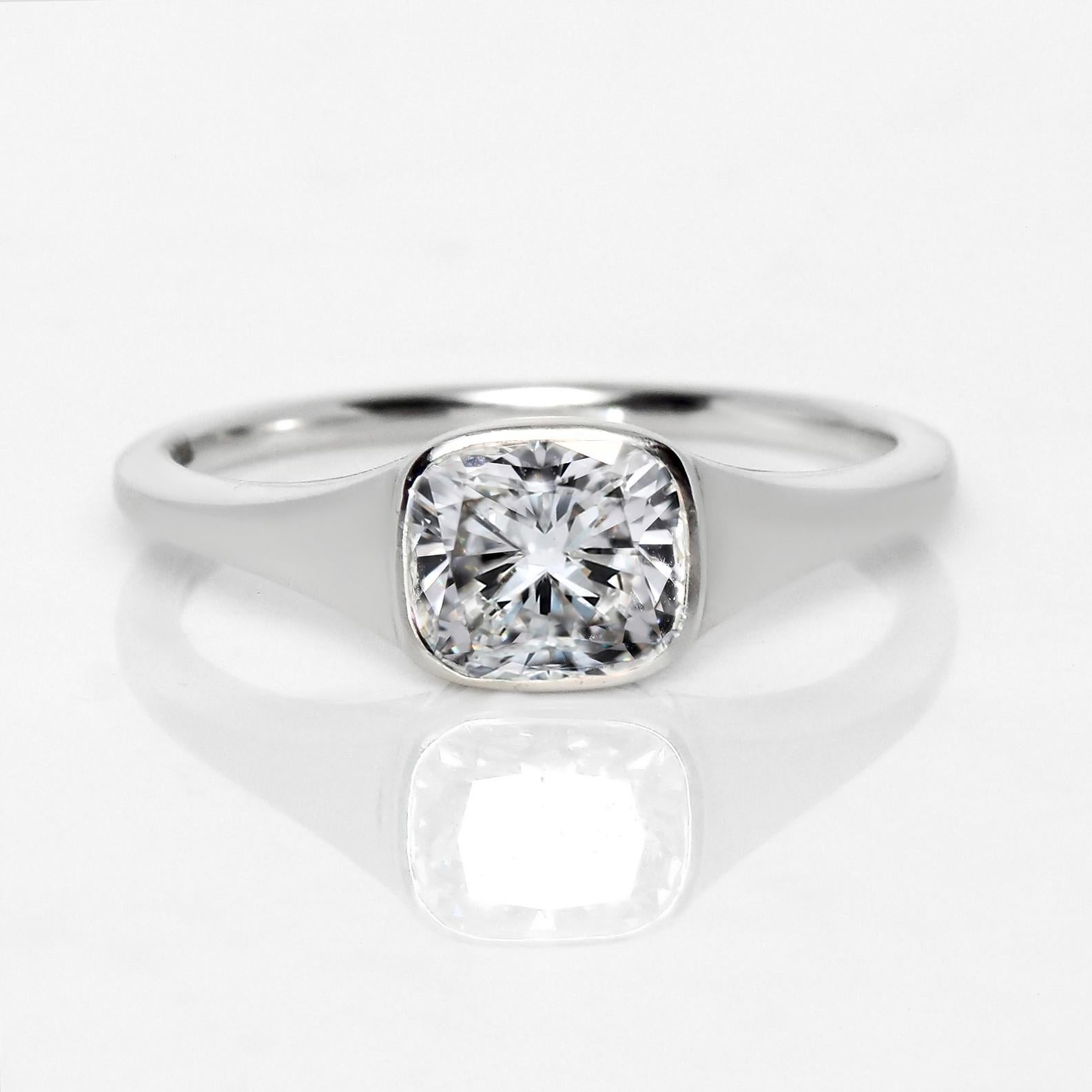 *IGI 18K 1.01 Ct H IF Natural Diamond Antique Engagement Ring*

An IGI-certified H IF cushion cut diamond weighing 1.01 ct set on an 18K white gold bezel design band.

Main Stone
Variety: Natural Diamond
Shape: Cushion Brilliant Cut
Weight: 1.01
