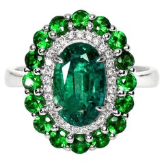 Anello di fidanzamento IGI 18k 2,21 carati con smeraldo e savorite in stile antico Art Deco
