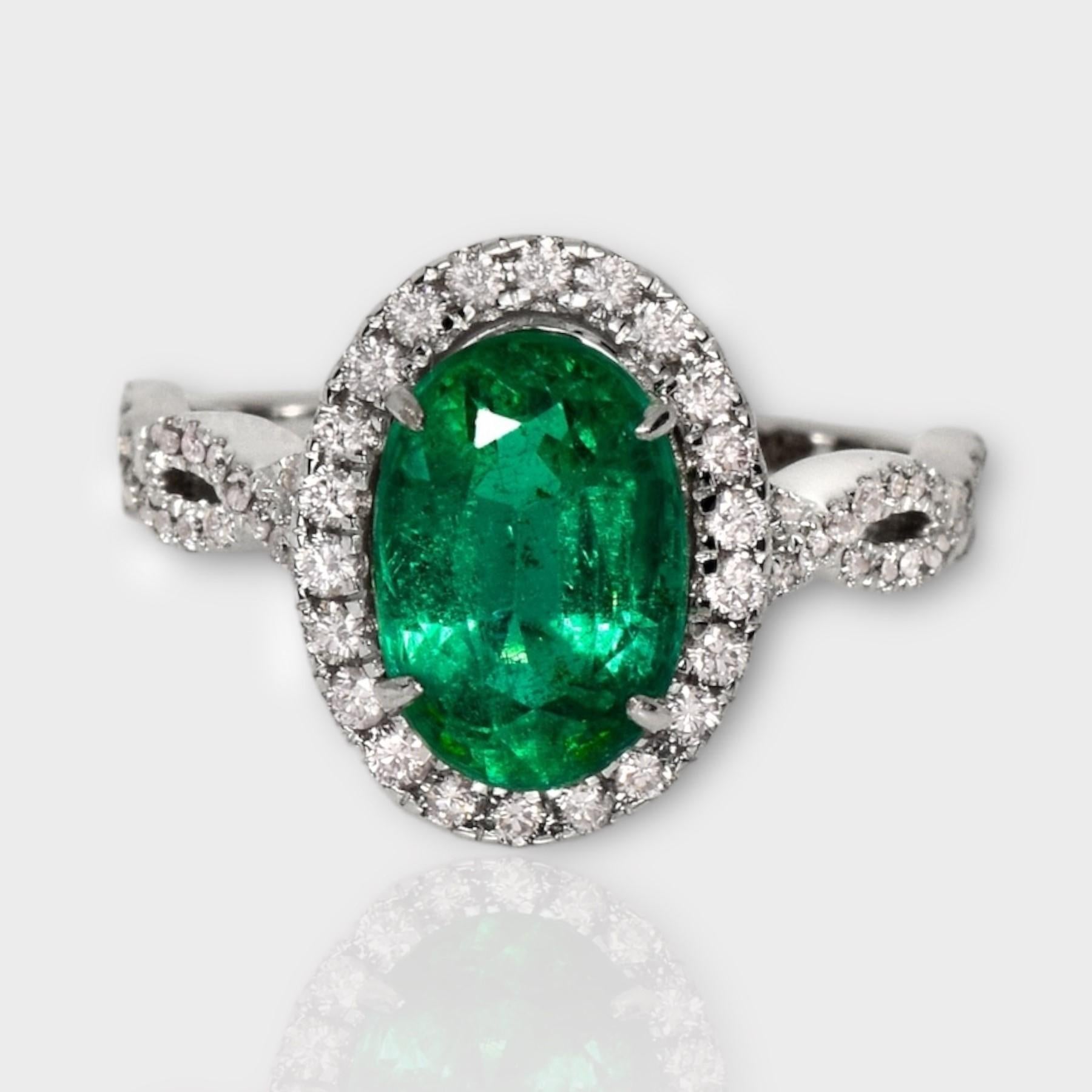 **IGI 18K White Gold 2.67 ct Emerald&Pink Diamonds Antique Art Deco Style Engagement Ring** 

An IGI-certified natural Zambia green emerald weighing 2.67 ct is set on an 18K white gold arc deco design band with natural pink diamonds weighing 0.44