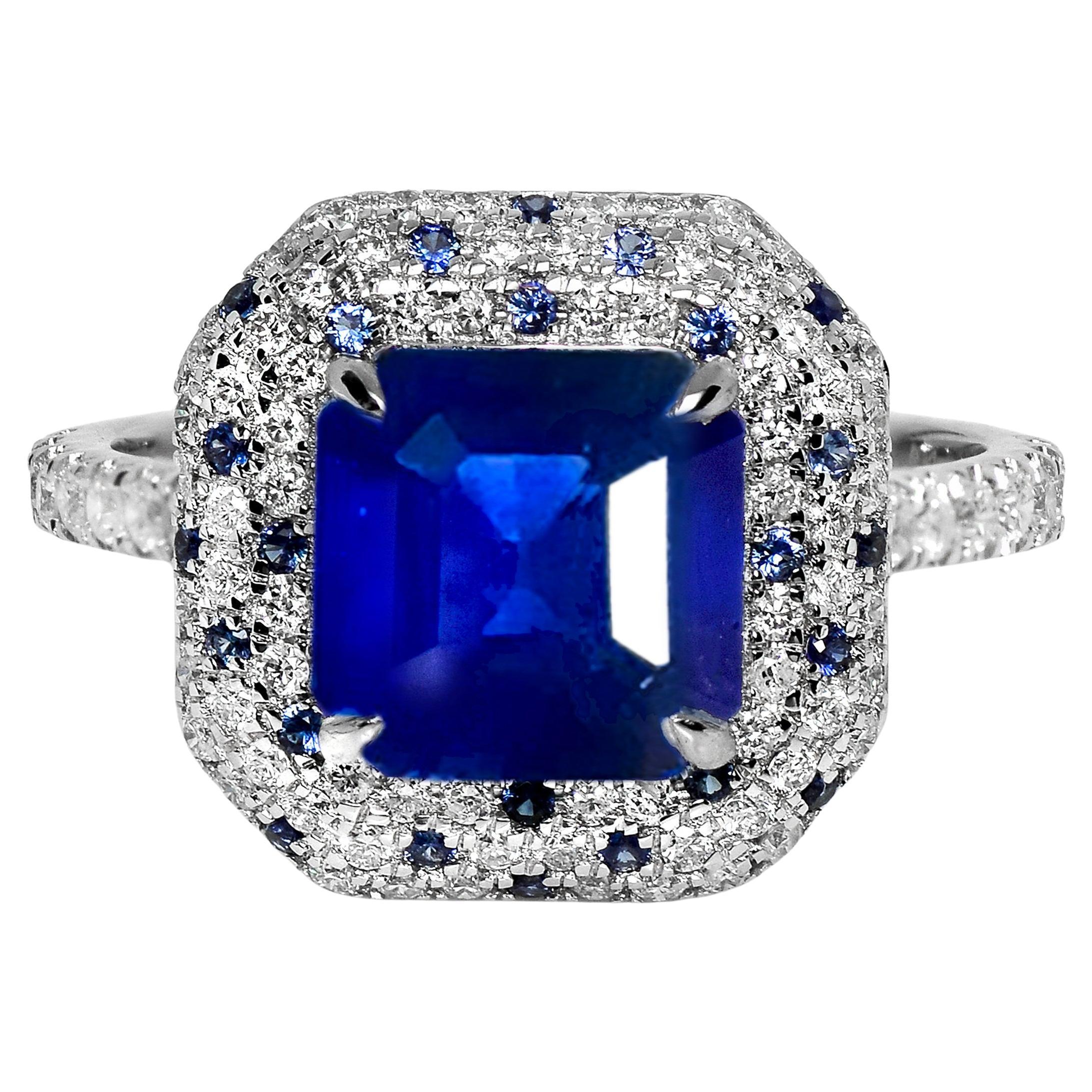 IGI Anillo de compromiso de zafiro azul real y diamantes de 18 quilates y 3,27 quilates naturales de Sri Lanka