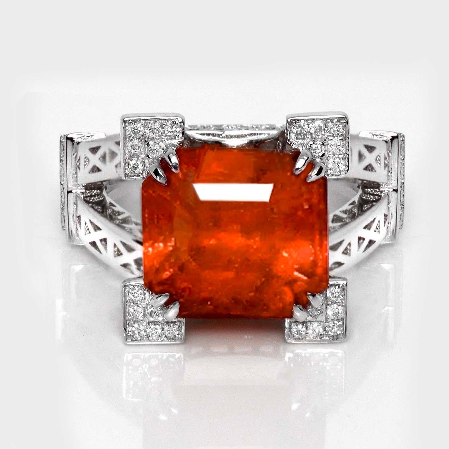 *IGI 18K 8.11 Ct Natural Fanta Garnet&Diamonds Antique Engagement Ring*

An IGI-certified natural vivid Fanta Garnet weighing 8.11 ct set on an 18K white gold the luxury design band with natural F-G, VS diamonds weighing 0.53 ct.

The ring combines