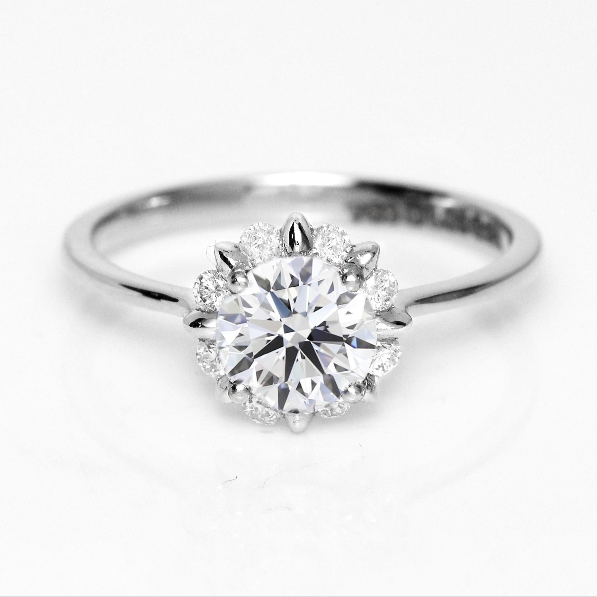 *IGI EX 18K 1.00 Ct G SI2 Natural Diamond Antique Art Deco Engagement Ring* (Bague de fiançailles Art Déco)

Un diamant rond de taille brillant certifié IGI G SI2 pesant 1,00 ct serti sur un anneau en or blanc 18 carats de style art déco avec des