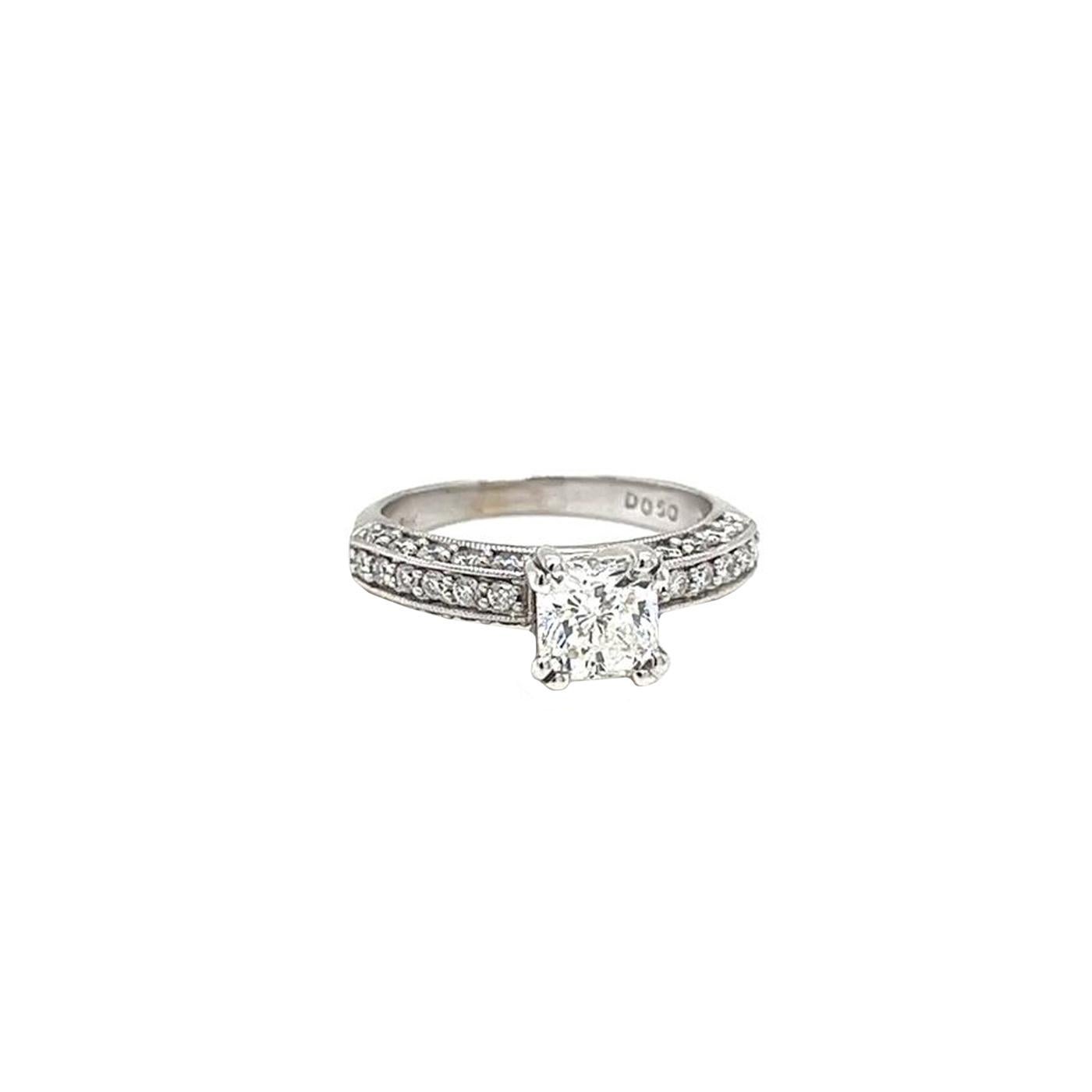 Grace your collection with the breathtakingly stunning, 2.21 Carat Radiant Cut Diamond Ring, IGI Certified. This exquisite piece, masterfully created with 18K Yellow Gold, portrays an expression of elegance and sophistication. It features a