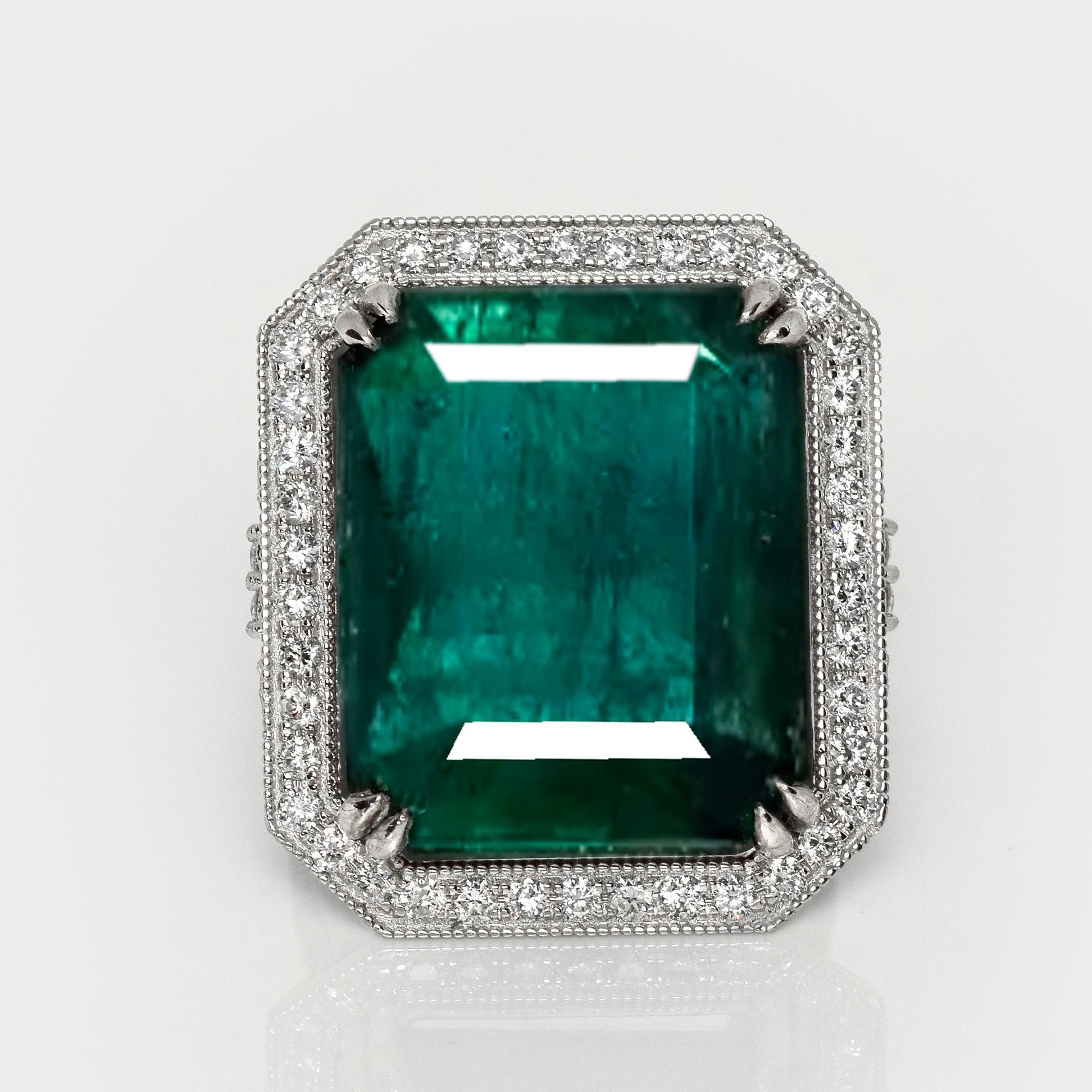 *IGI 26.30 Ct 14K White Gold Natural Zambian Emerald⋄ Engagement Ring*

One certified natural intense green Zambian emerald weighing 26.30 ct set on the 14K white gold with natural FG VS round brilliant diamonds weighing 1.52 ct.  

The beautiful