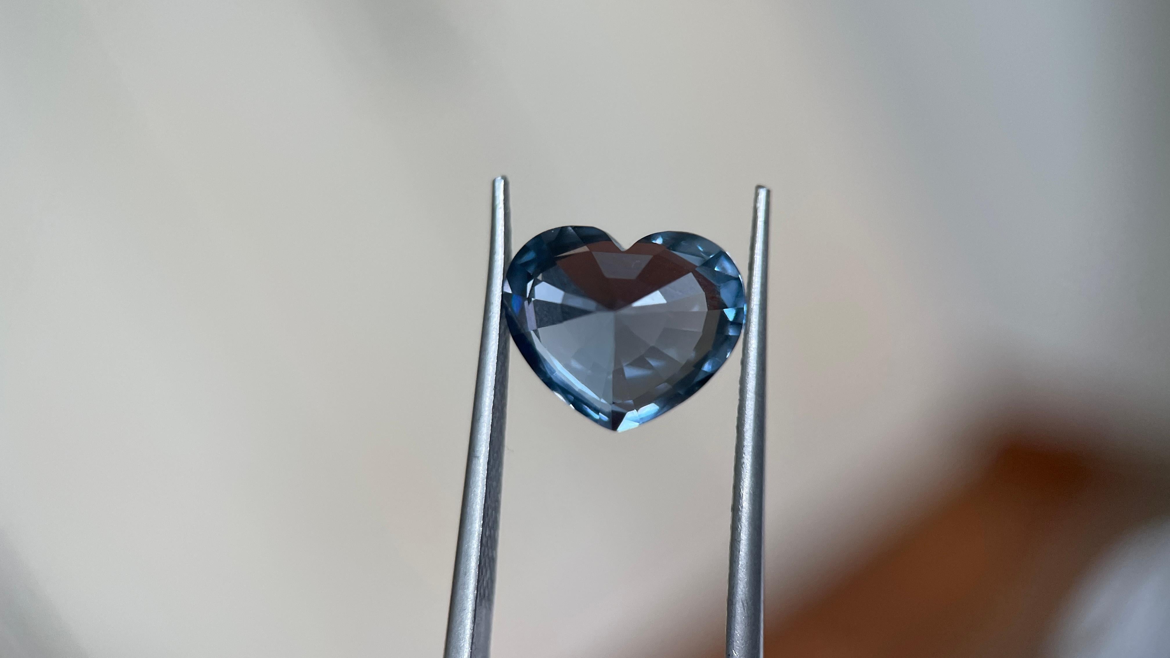 Kindly note that the stated price for this item is fixed and non-negotiable. We appreciate your understanding and respect for our pricing decision.

This greyish-blue spinel shows a soft, shifting glow in the light. Weighing 3.46 carats, the