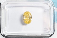 IGI Cert 0.79ct Natural Fancy Light Orangy Yellow Diamond, Customisable Ring