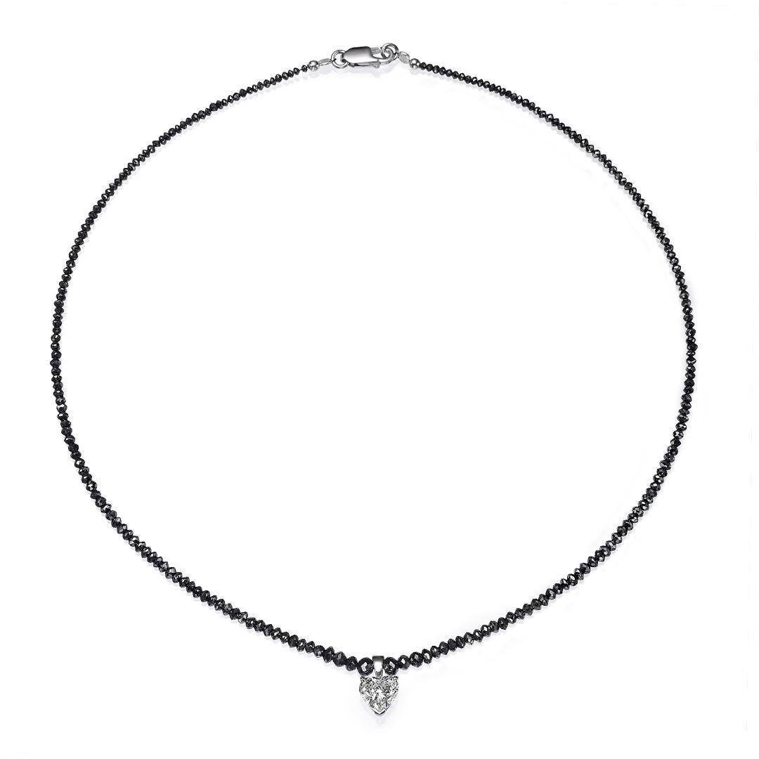 
Our classic handcrafted necklace is staring a 1.50 carat heart shaped diamond J /SI2 and set on 14k white gold. 
The necklace is designed with 230 natural black briolette diamonds 20 Carat total diamond weight. The timeless necklace will accompany
