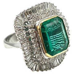 Retro IGI Certificated 8.00 carats Fine Emerald and Diamond ring.