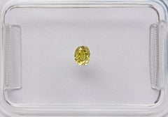 IGI certified - 0.11ct - VS2 - Fancy Vivid Greyish Yellow - Diamond