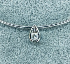 IGI Certified 0.28 Carat Round Diamond Tear/Pear Shape Pendant Omega Necklace