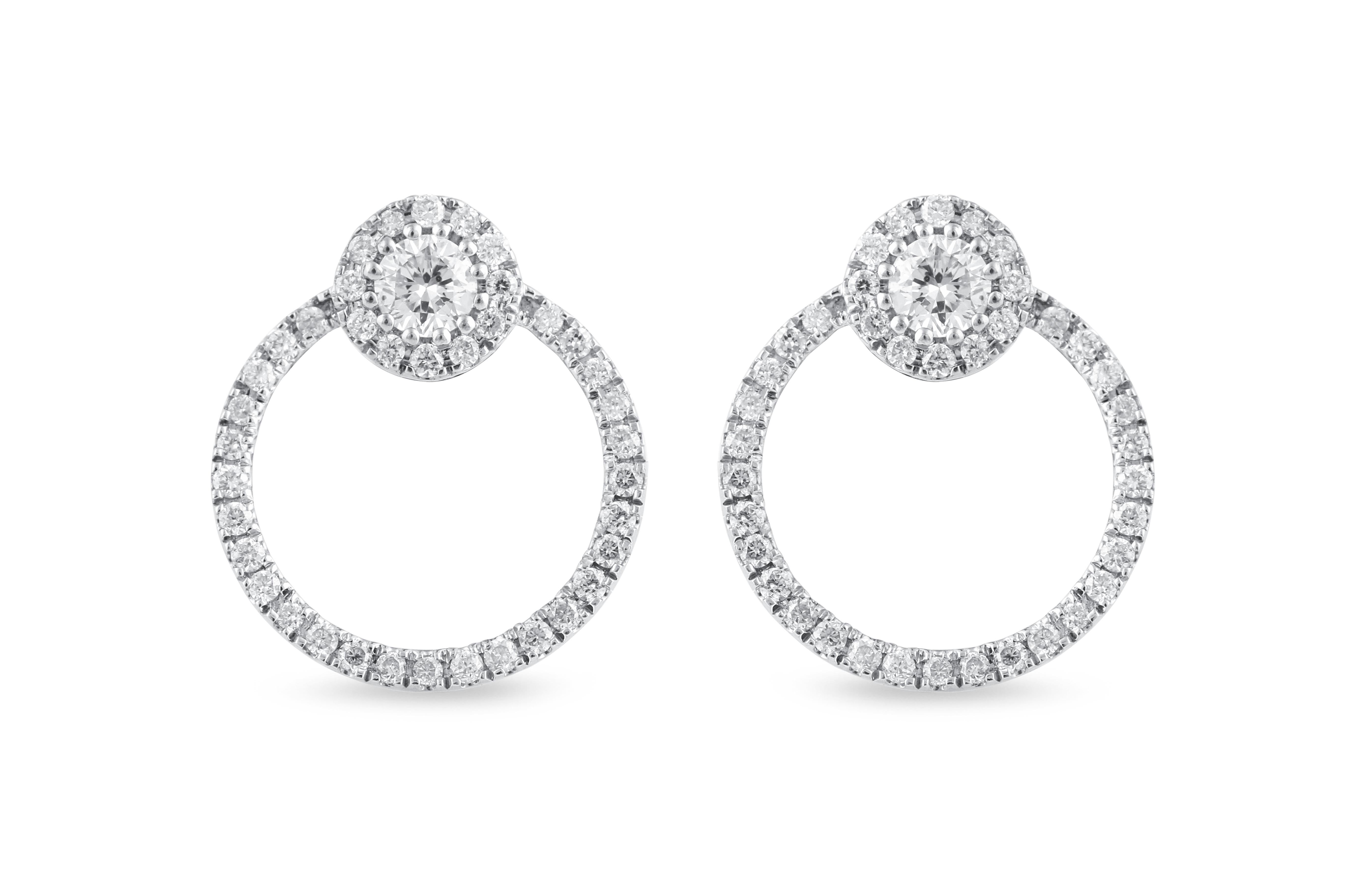Our gorgeous diamond Earrings are finely set into the most astonishing designs ranging from modern-era jewels to fascinating classics, and they will certainly rekindle the romance between you and your spouse. Our Diamond Earrings are a regal