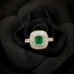 IGI certified 0.42 Carat Colombian Emerald & Diamond Ring in 18K White Gold