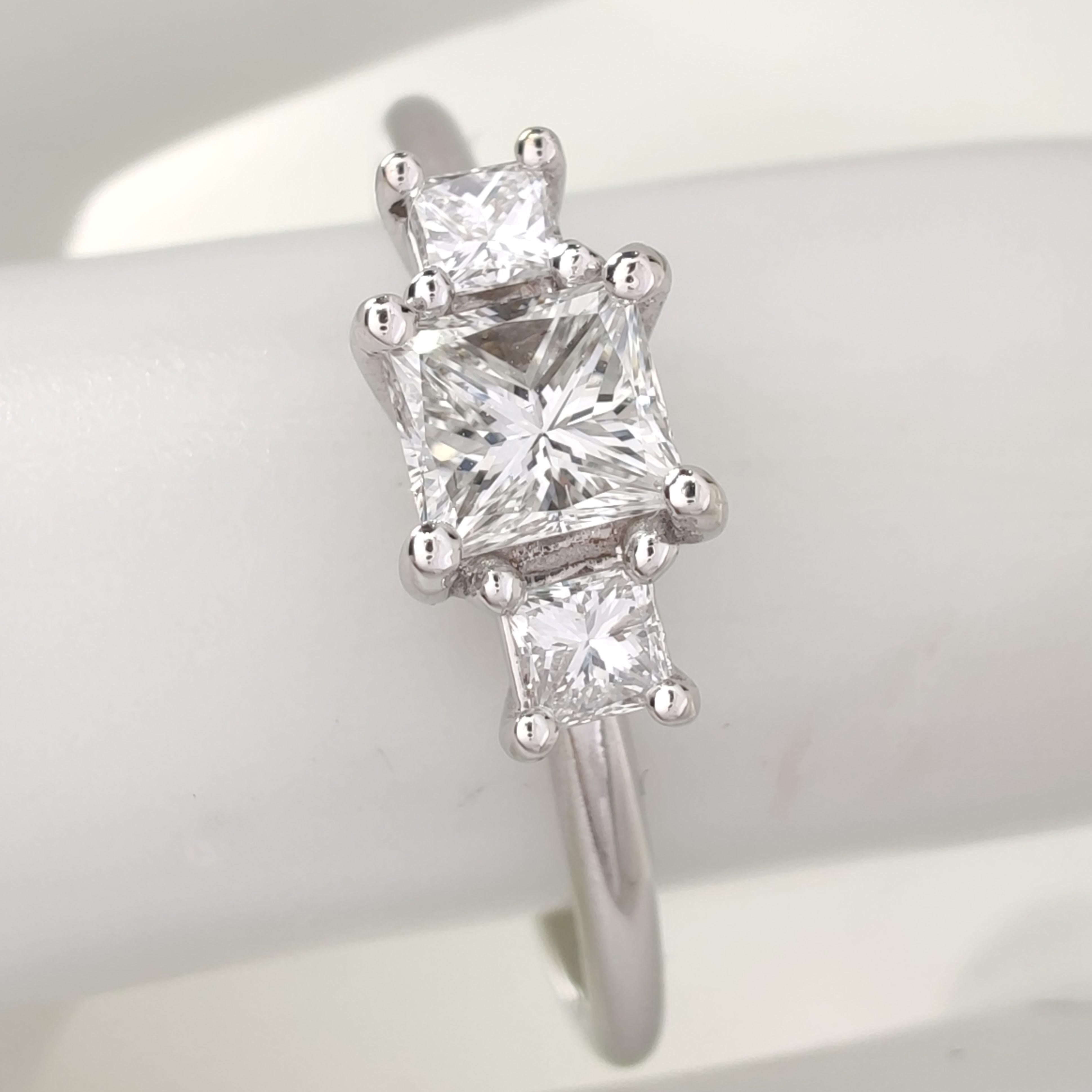 0.50ct Natural Diamond Three-Stone Ring in 18K White Gold – Princess Cut

Celebrate timeless elegance and symbolism with this refined three-stone diamond ring, beautifully crafted in solid 18K white gold and weighing 1.90 grams. The trio of natural