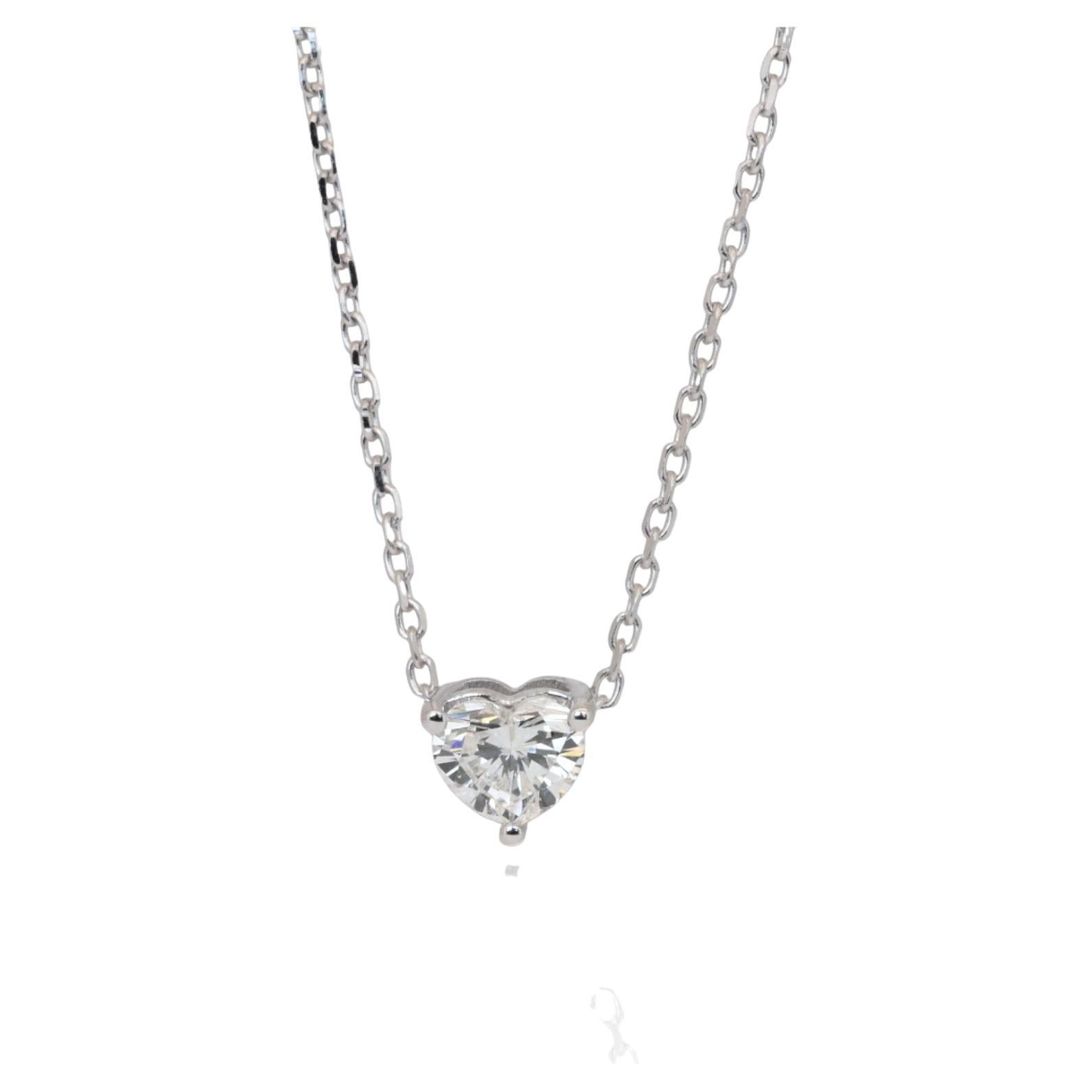 Collier solitaire en diamant certifié IGI de 0,51ct avec pendentif en forme de coeur en vente