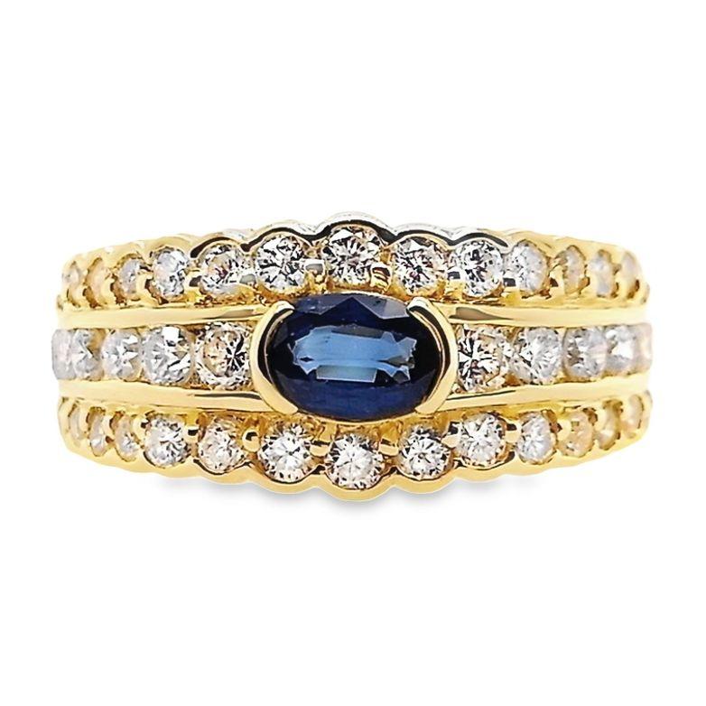 Experience the enchantment of an un-treated intense-blue oval sapphire, weighing 0.51 carats, embraced by 42 sparkling natural diamonds on a radiant 18K yellow gold ring. This extraordinary piece seamlessly marries the captivating allure of the