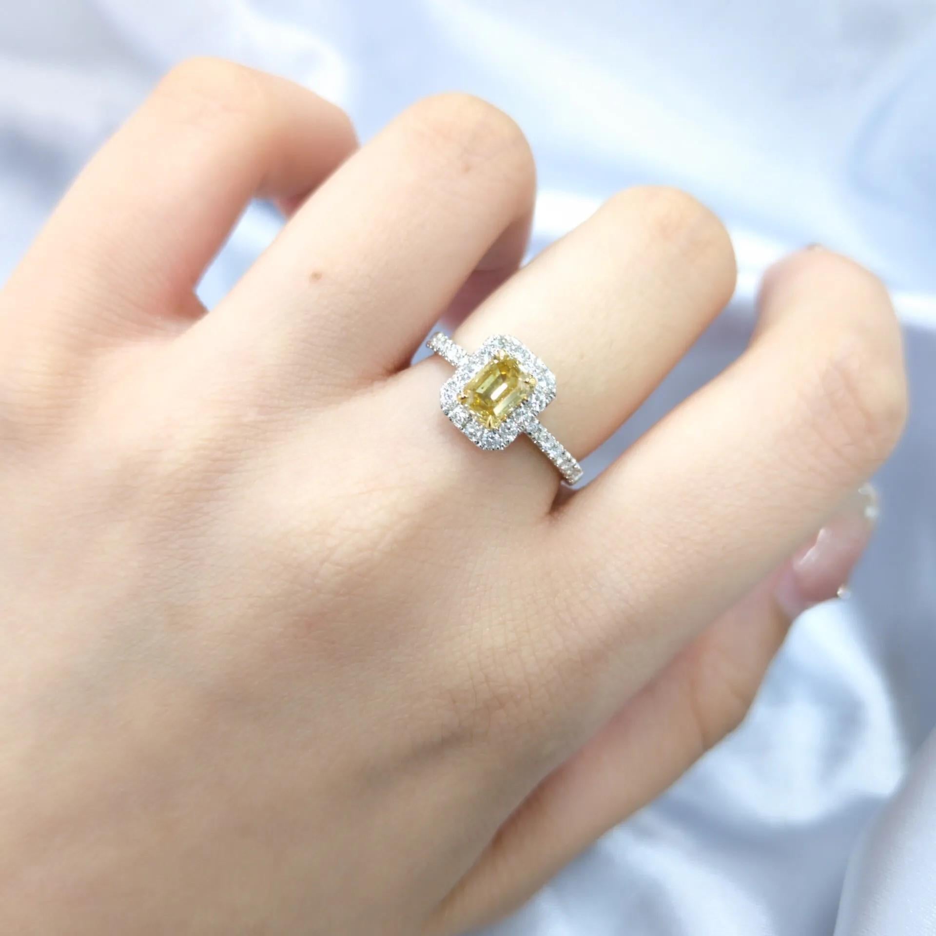 Modern IGI Certified 0.59 Carat Yellow Diamond & 0.27 Carat Diamond Ring in 18K Gold For Sale