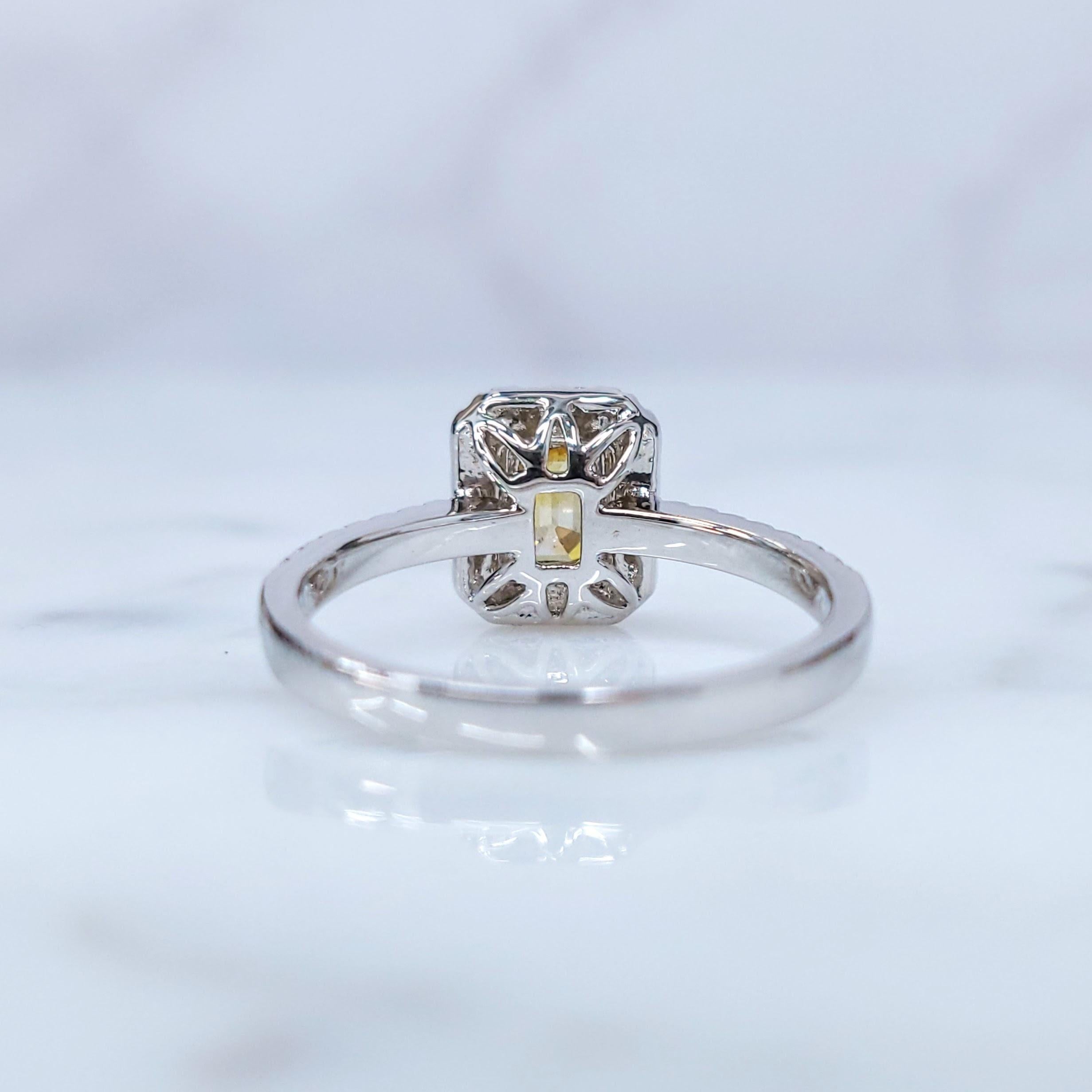 IGI Certified 0.59 Carat Yellow Diamond & 0.27 Carat Diamond Ring in 18K Gold For Sale 1