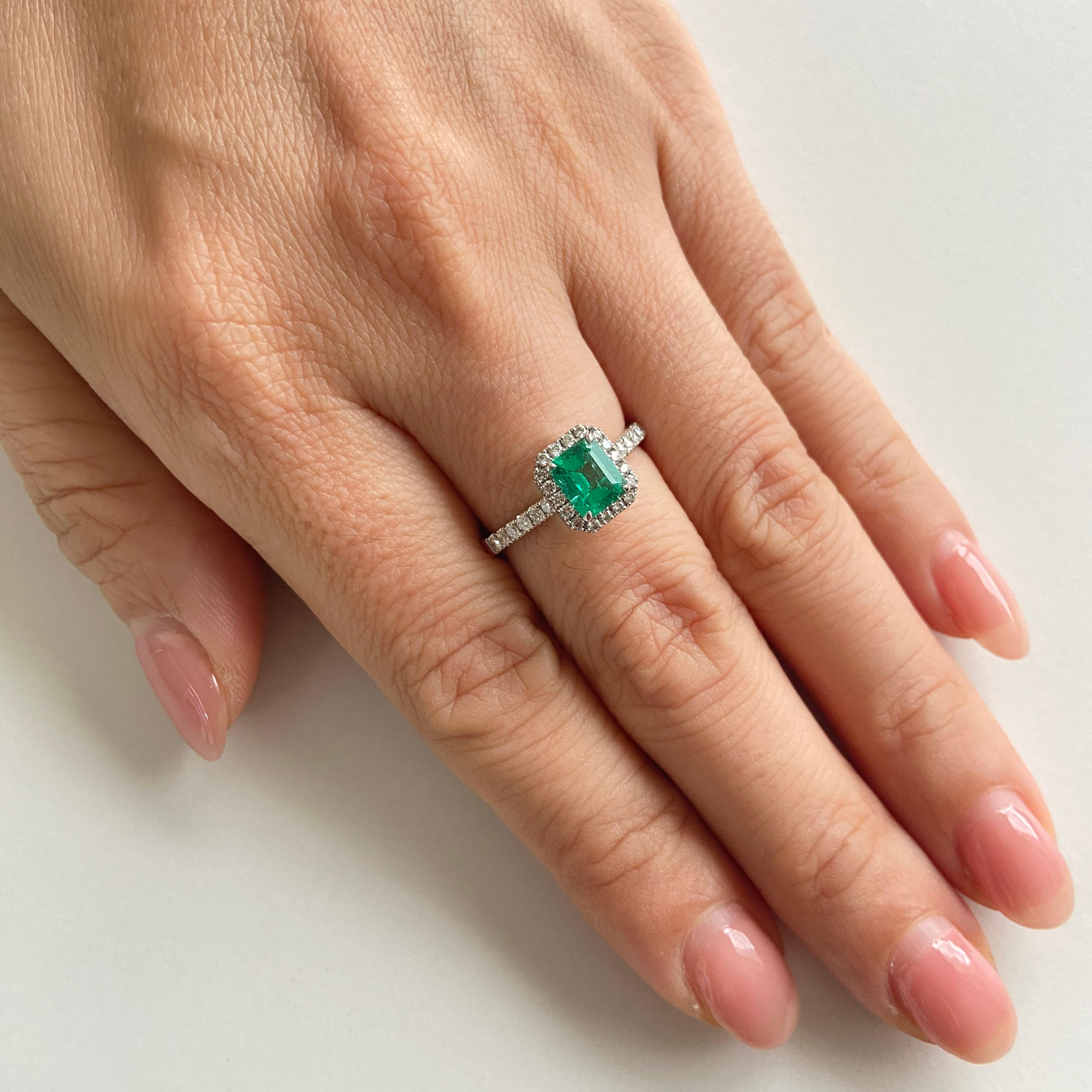 A stunning Emerald centerpiece stone from the mines of Muzo in Colombia, embraced by sparkling white diamonds. The Emerald is entirely natural with no indications of thermal treatment, preserving its original color and clarity as nature intended.