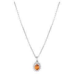 IGI Certified 0.69 Carat Natural Sapphire and Diamond Pendant in 14K Gold