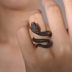 Anillo con motivo de serpiente de diamantes y rubíes de 0,76 quilates, certificado por IGI, en oro de 8K