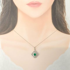 IGI Certified 0.88 Carat Colombian Emerald and Diamond Pendant in 18K White Gold