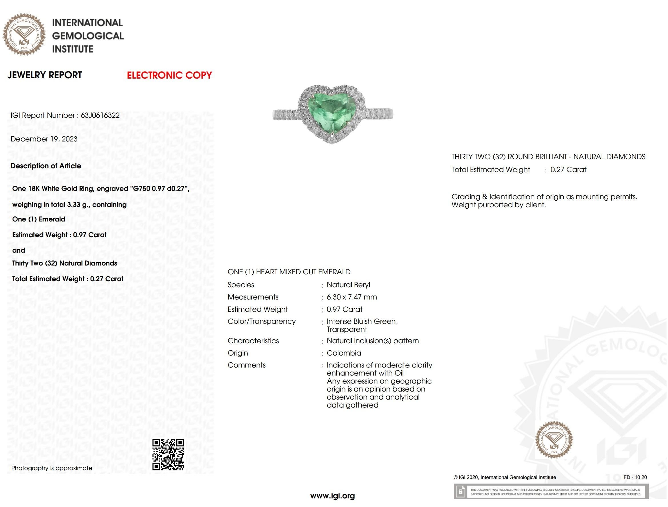 IGI certified 0.97 Carat Colombian Emerald & Diamond Ring in 18K White Gold For Sale 5