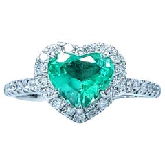 IGI certified 0.97 Carat Colombian Emerald & Diamond Ring in 18K White Gold