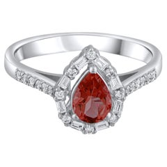 Bague imposante en or 14 carats sertie d'un grenat naturel de 0,99 carat certifié par l'IGI et de diamants
