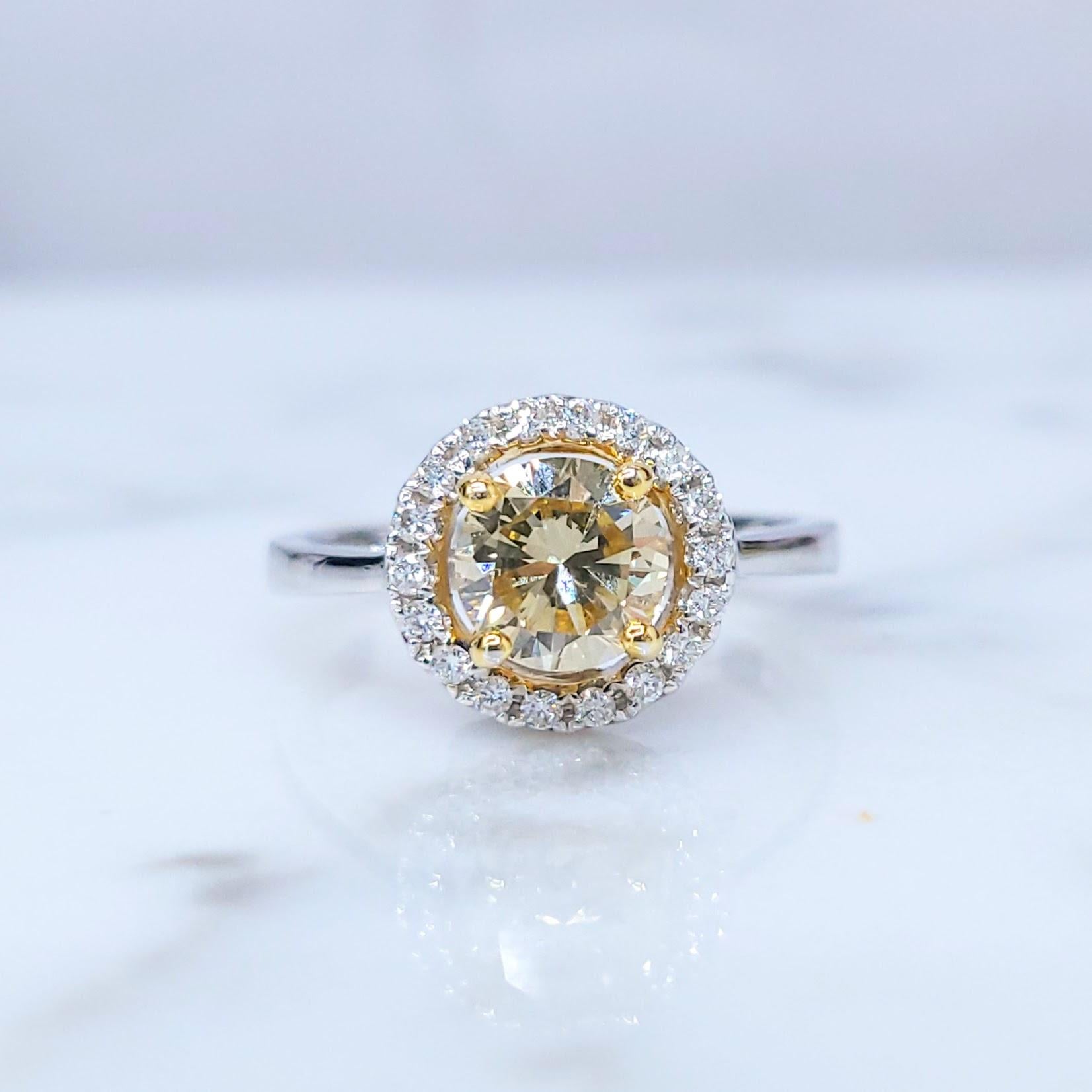 Round Cut IGI Certified 1.00 Carat Yellow Diamond & 0.15 Carat Diamond Ring in 18K Gold For Sale