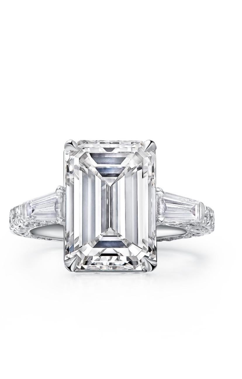 An exquisite contemporary design, so modern, luxurious fashion styles, very adorable.
Ring come in 18K gold with IGI Certified 7.00 Carats of Natural Diamonds in perfect emerald cut , H color SI2 clarity, and two side diamonds in baguettes cut and