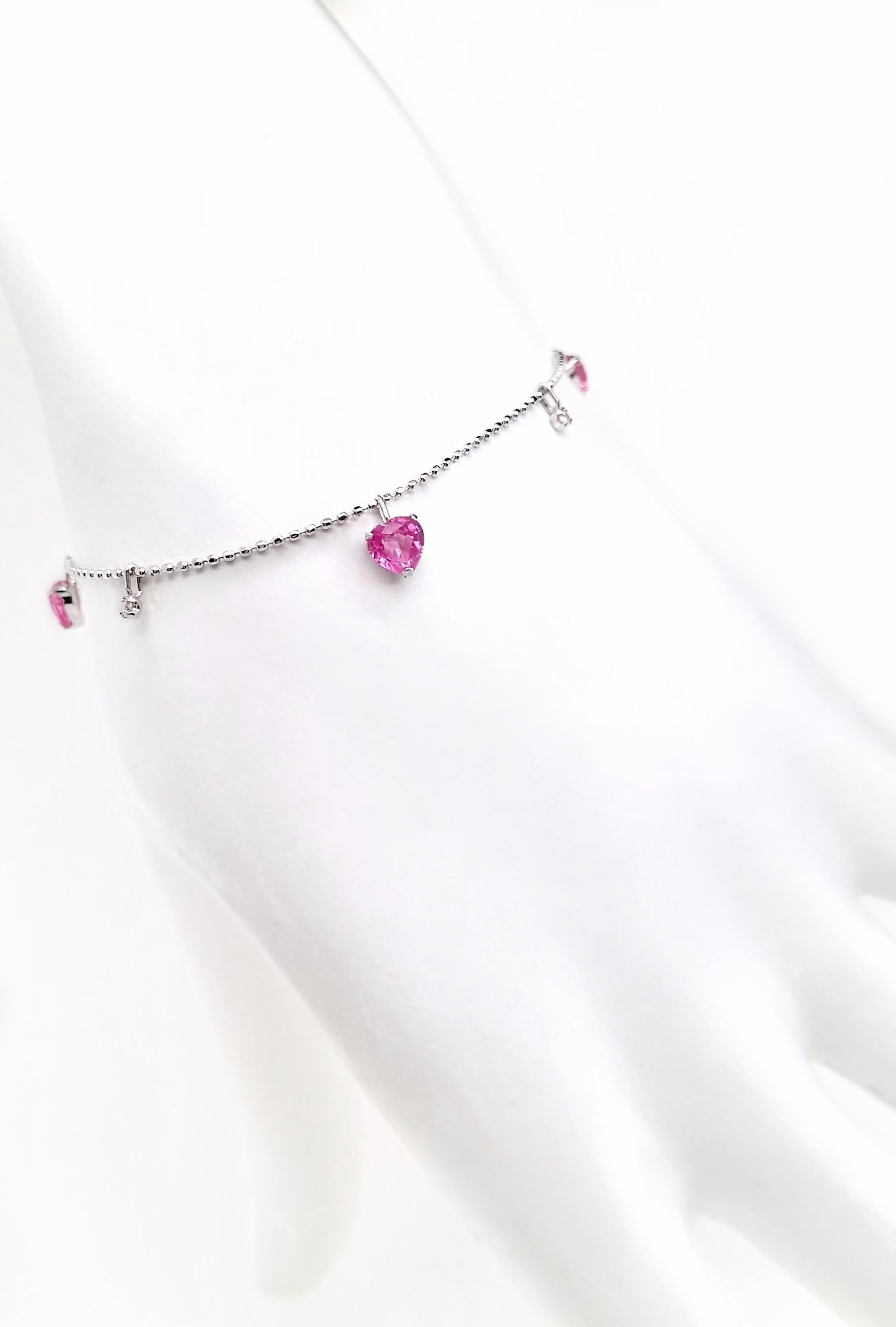 Enchant with charm wearing our elegant Top Crown Jewelry Collection of 18K White Gold Bracelet featuring a 1.00ct IGI Certified Heart-Shaped mixed-cut Pink Sapphires and sparkling 0.06ct natural diamonds.

This ring is certified by IGI laboratory,