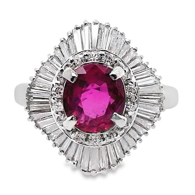 Add a touch of elegance to your look with our Top Crown Jewelry new collection platinum ring. It highlights a beautiful 1-carat oval ruby surrounded by 62 sparkling natural diamonds, giving you a simple yet stunning accessory that effortlessly