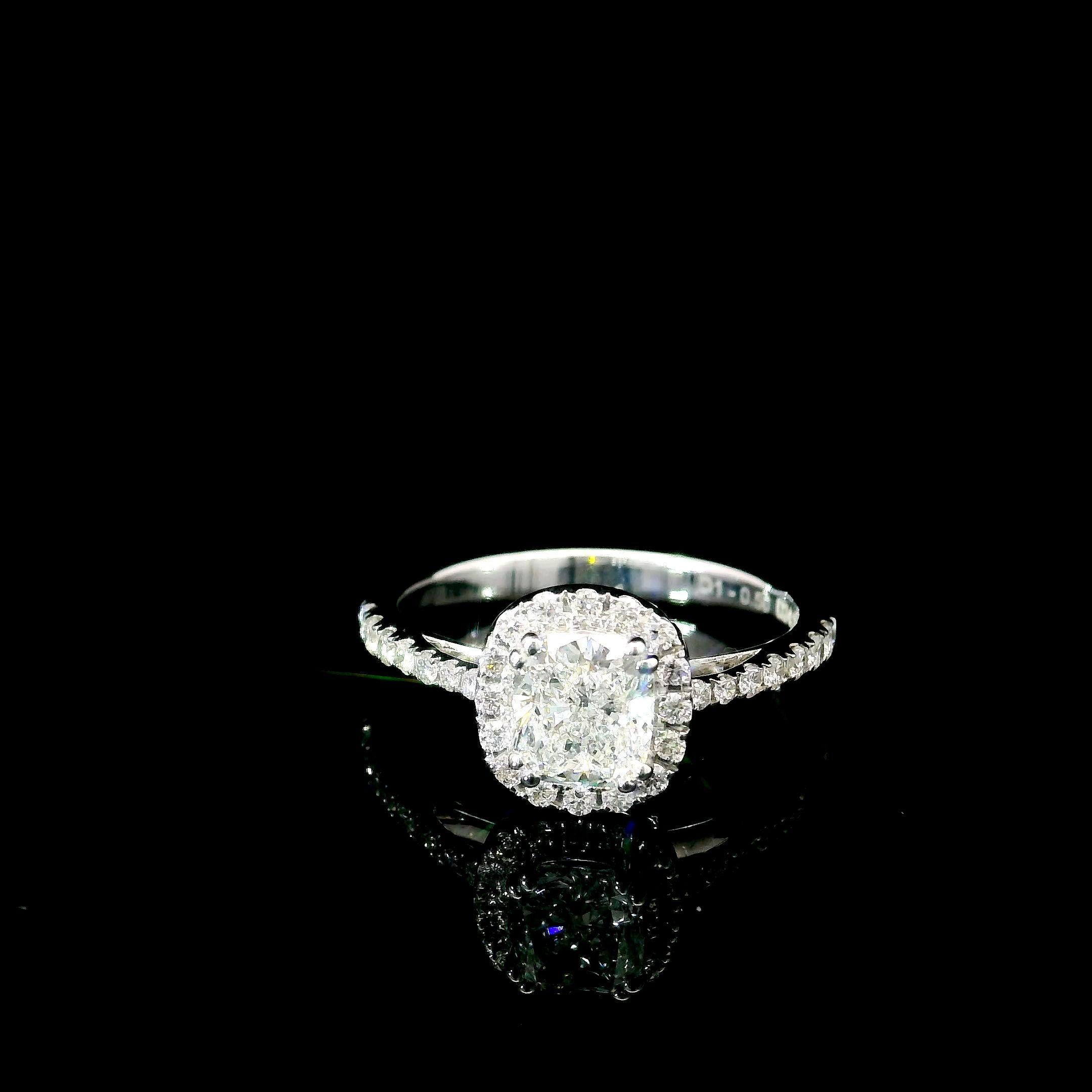 18kt white gold ring with diamonds

  Gold colour & karat: White gold 18kt
  Weight: 3.92 grams
  
  Set with-
  Stone type: Diamonds
  Shape: Oval
  Carat: 1.01 ct
  Colour: F
  Clarity: SI2
  
  Surrounding Stones: Diamonds
 1) White Diamonds
 