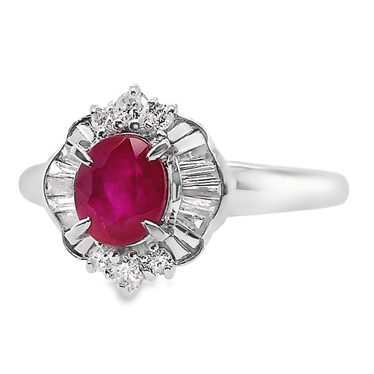Sparkle in style with our Top Crown Jewelry House collection platinum ring, showcasing a beautiful vivid purplish red Burma ruby adorned by sparkling natural diamonds. A touch of luxury for your everyday ensemble.

This ring is certified by IGI