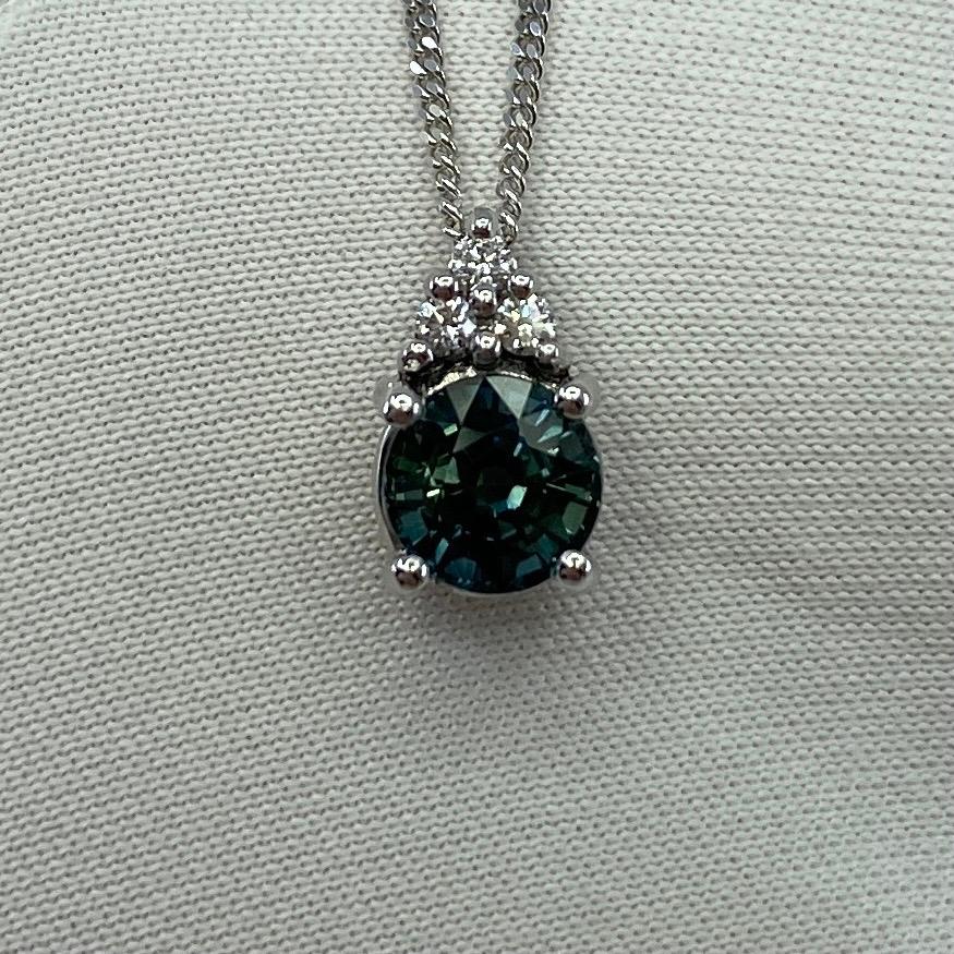 Rare Colour Change Sapphire & Diamond Platinum Pendant Necklace.

A fine IGI certified 1.02 carat untreated sapphire with stunning colour change effect. Changing colour depending on the light its viewed in. Very rare for natural gemstones,