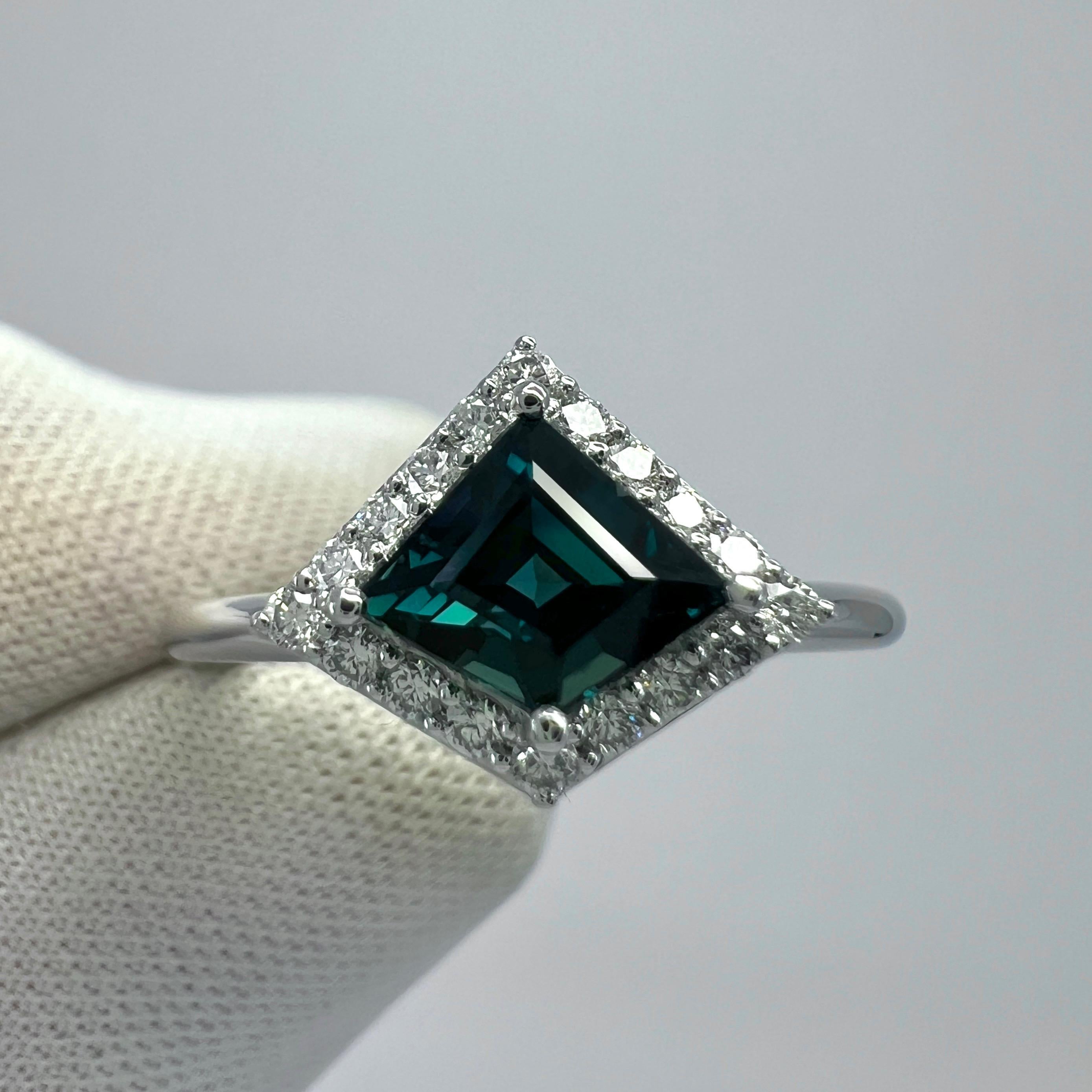 Natural Untreated Deep Teal Blue Sapphire Fancy Kite Cut 18k White Gold Diamond Halo Ring. 1.04 Carat total.

0.87 Carat natural sapphire with a unique fancy kite cut and stunning deep teal blue colour. Also has excellent clarity, very clean stone.