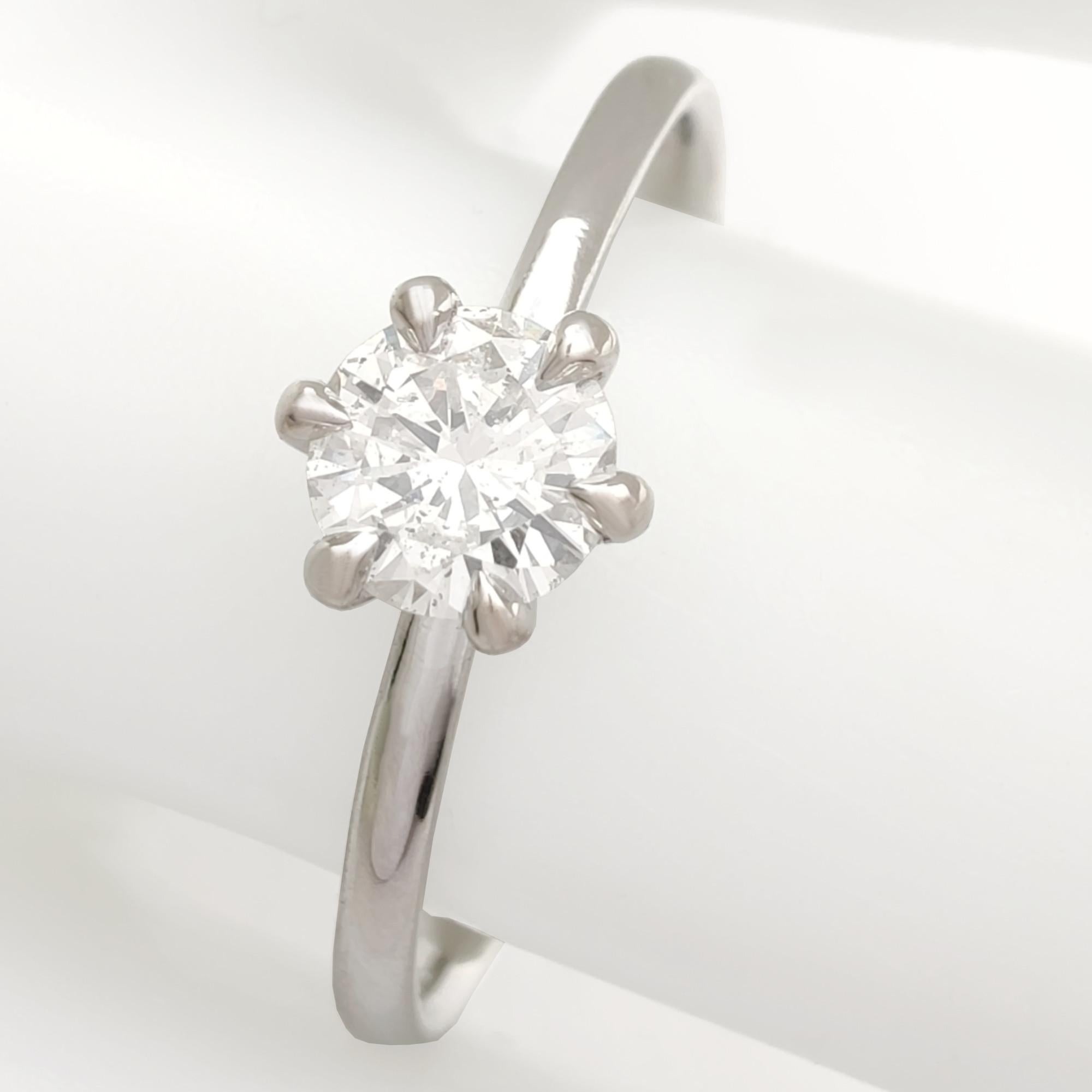 Contemporary IGI Certified 0.40 Ct Round Brilliant Diamond Engagement Ring in 18K White Gold For Sale
