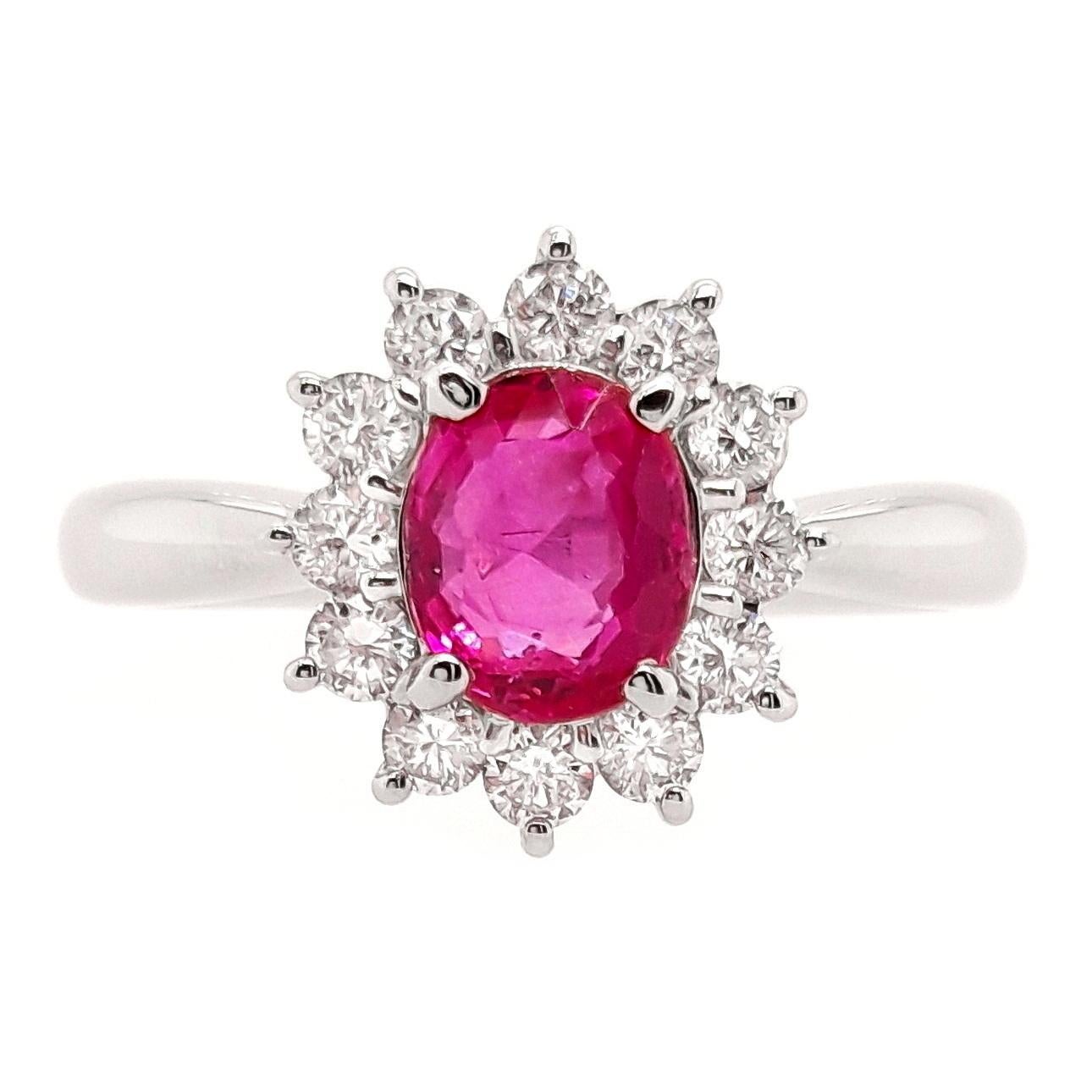 Add a touch of timeless charm to your collection with Top Crown Jewelry House collection, this 1.09 carats un-treated ruby platinum ring. The intense purplish-pink-red hue is beautifully complemented by shining diamonds, creating a captivating piece
