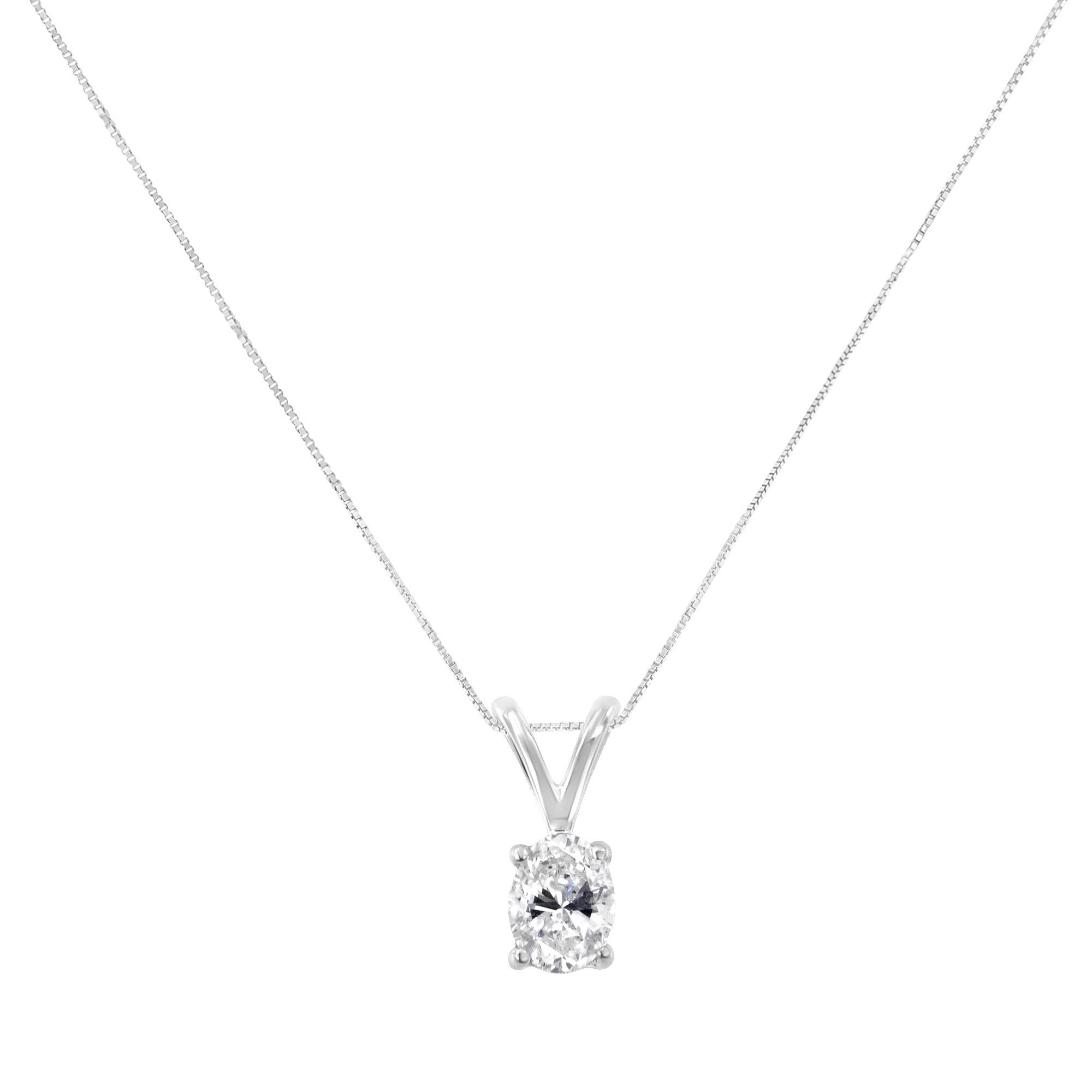 A brilliant 1/5ct oval cut diamond is highlighted in this classic four prong pendant. The pendant delicately hangs from a rolo chain. This 10k white gold necklace is perfect for any occasion. This beautiful necklace includes 18” rolo chain with