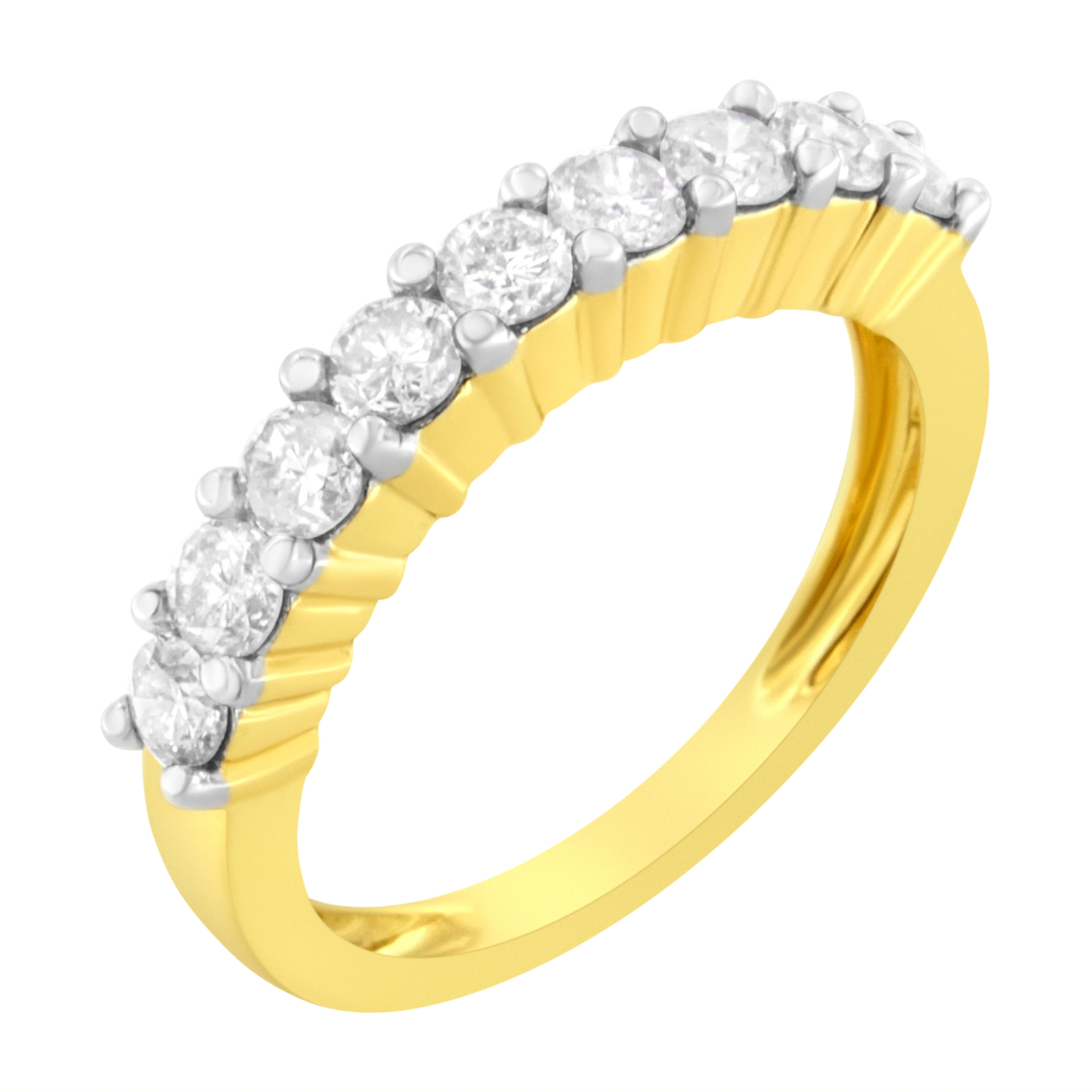 This classic and elegant 10k yellow gold band ring boasts 1 carat of beautiful, natural diamonds. Nine round-cut diamonds embellished in a prong setting sit on top of this glimmering yellow gold band. This is a timeless piece that you will want to