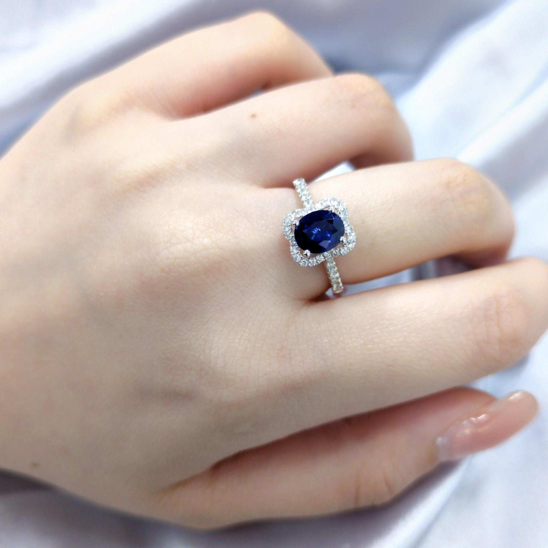 Discover the captivating allure of this exquisite ring, showcasing a magnificent 2.02-carat oval mixed cut sapphire with a mesmerizing violetish blue hue. This unique and sophisticated color offers a captivating blend of blue and violet, evoking the