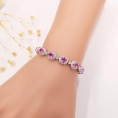 Eternity-Armband aus 18 Karat Weißgold mit IGI-zertifiziertem 11,08 Karat rosa Saphir und Diamant