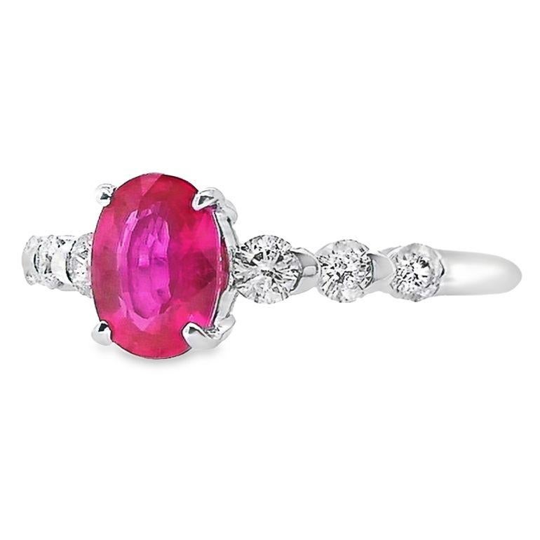 Timeless beauty meets contemporary elegance in our Top Crown Jewelry House's newest collection. This exquisite platinum ring showcases a stunning 1.13-carat oval-cut natural pink sapphire, beautifully accented by 0.32 carats of dazzling natural