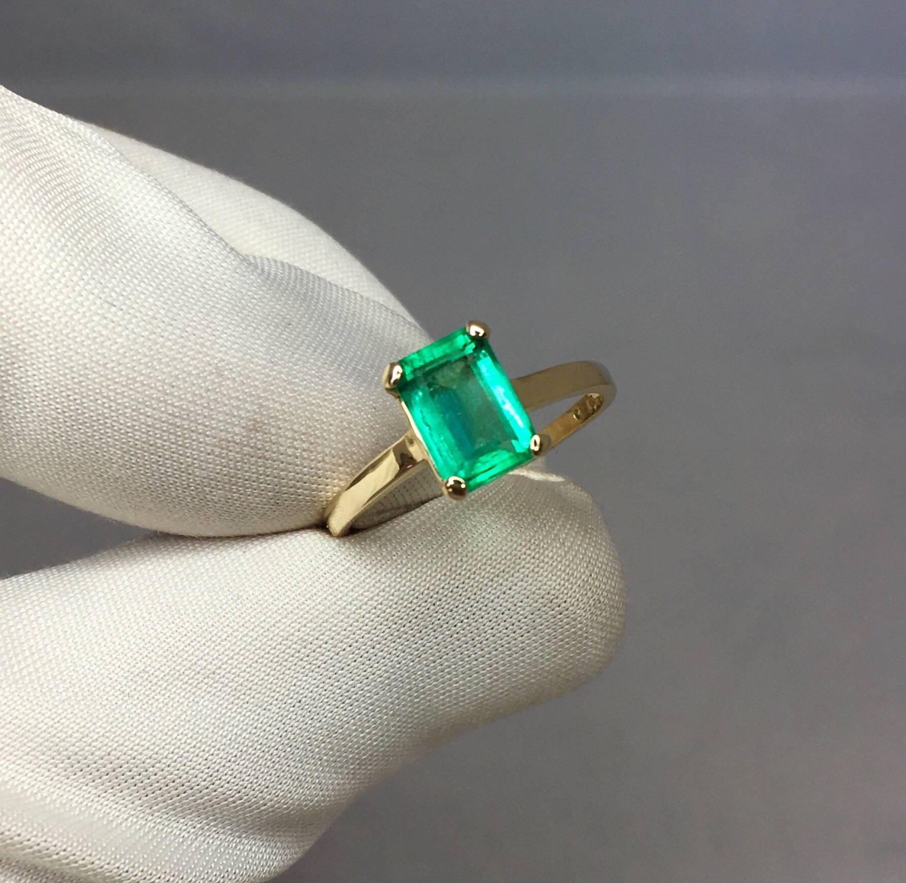 Fine natural vivid green Colombian emerald solitaire ring.

1.17 carat stone with stunning vivid green colour and very good clarity. Obviously some inclusions as to be expected with natural emeralds, but a clean stone by emerald standards. Also with