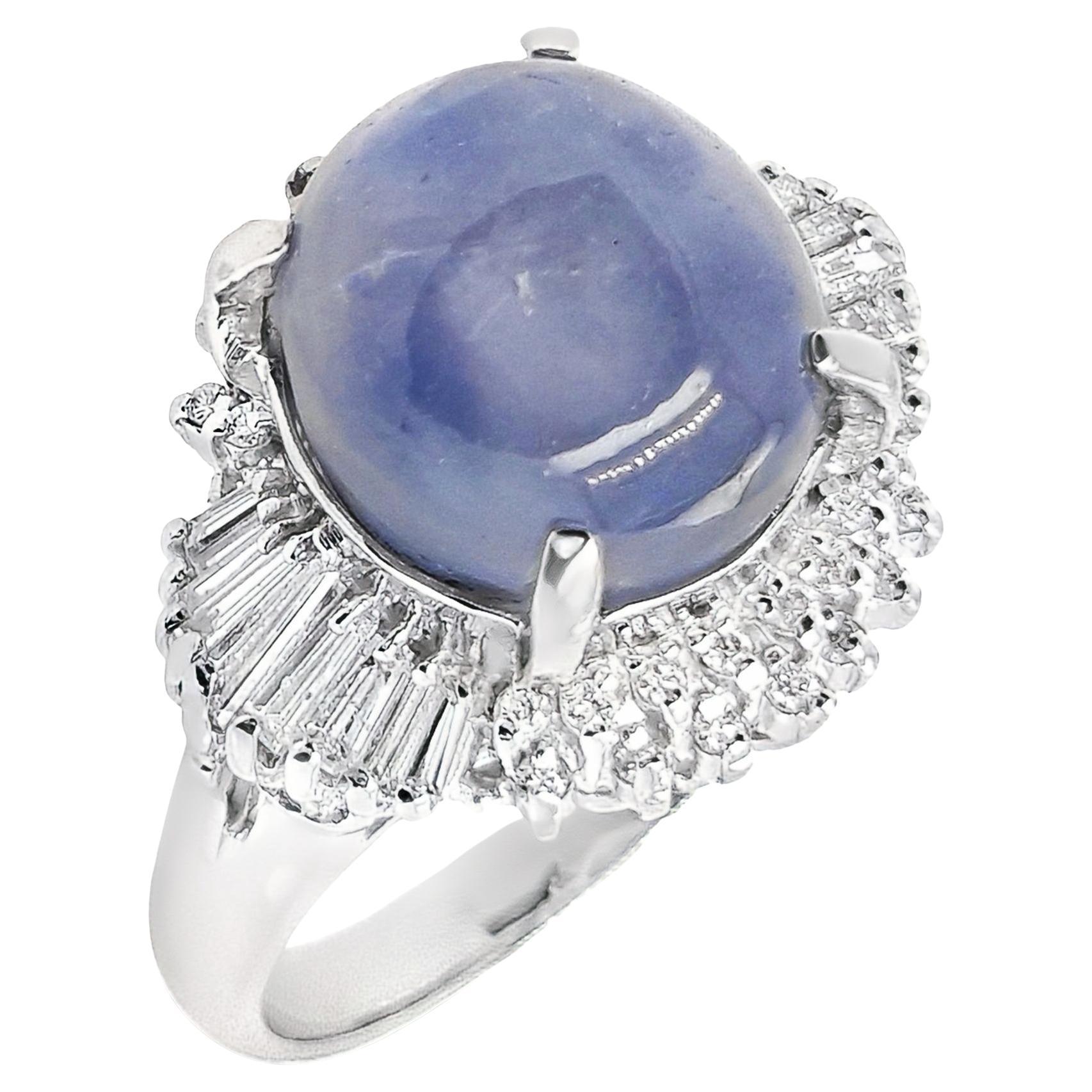 Unveil extraordinary elegance with this exceptional platinum ring featuring a mesmerizing 11.75ct natural Untreated Star Sapphire – a rare gem that captures light with its enchanting asterism effect. Adorned with 0.53ct of pristine diamonds, this