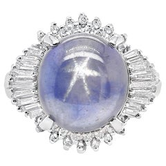 IGI Certified 11.7ct Untreated Star Sapphire and 0.53ct Diamonds Platinum Ring