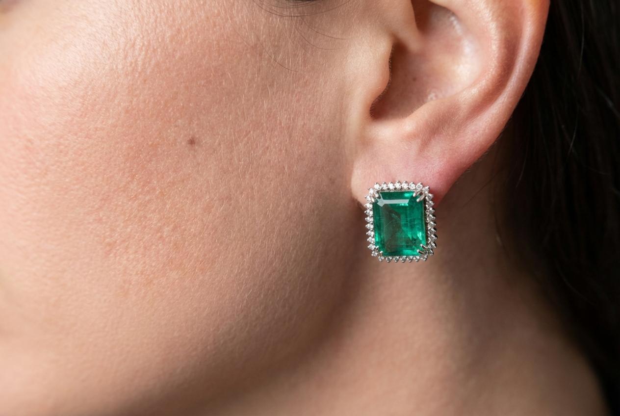 IGI Certified 12 Carat Emerald and Diamond Stud Earrings in White Gold For Sale