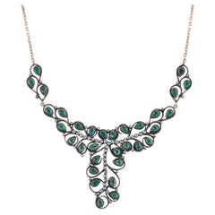 Collar llamativo con motivos florales de diamantes y esmeraldas, certificado por IGI, de 12,20 quilates, en oro de 8K